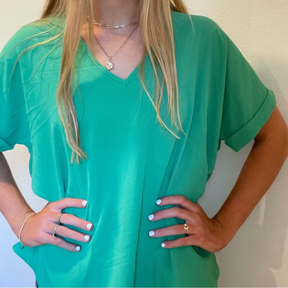 She +sky green shirt brand new with tags